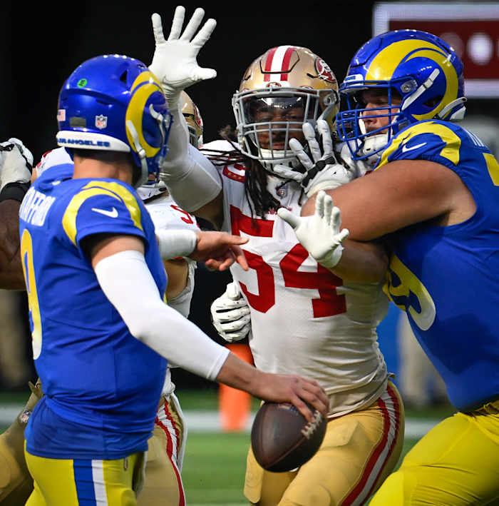 Oct 30, 2022; Inglewood, California, USA; San Francisco 49ers linebacker Fred Warner (54) and Los Angeles Rams quarterback Matthew Stafford (9) and Los Angeles Rams offensive tackle Rob Havenstein (79) during the third quarter at SoFi Stadium. Mandatory Credit: Robert Hanashiro-USA TODAY Sports